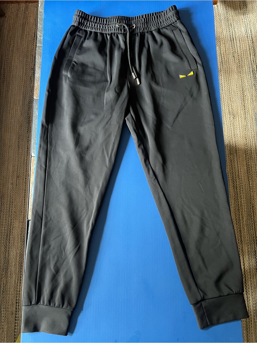 Fendi Black Joggers with Yellow Eye Detail